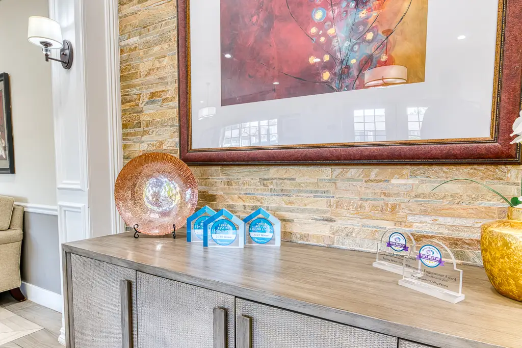 Chef putting the finishing touches on a delicious-looking plate of food